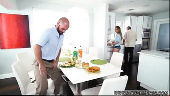 During dinner with her father, the blonde makes a guy blowjob under the table